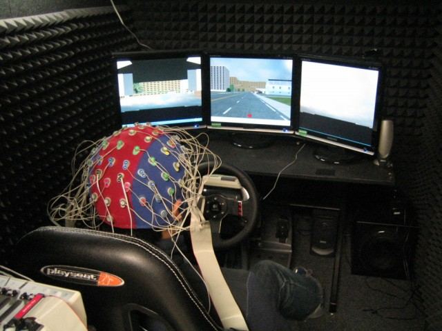 Electroencephalogram recording: scalp electrodes and traces of electrical brain activity.